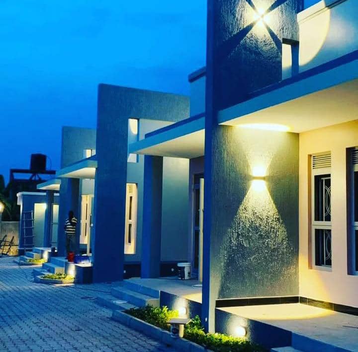 Architectural exterior lighting installation illuminating modern residential homes in Kampala, Uganda by Dynawatt Engineering Services