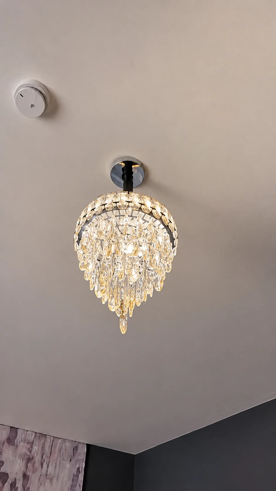 Bespoke crystal lobby chandelier installation in Kiboga